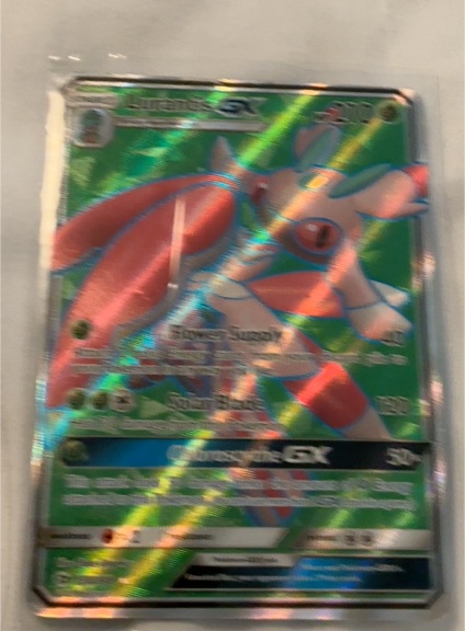 2017 Pokémon Sun & Moon Base Set #138 Lurantis GX — front