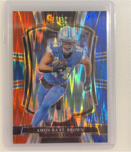 2025 Panini Select #170 Amon-Ra St. Brown Premier Level Red & Blue Shock Prizm — front