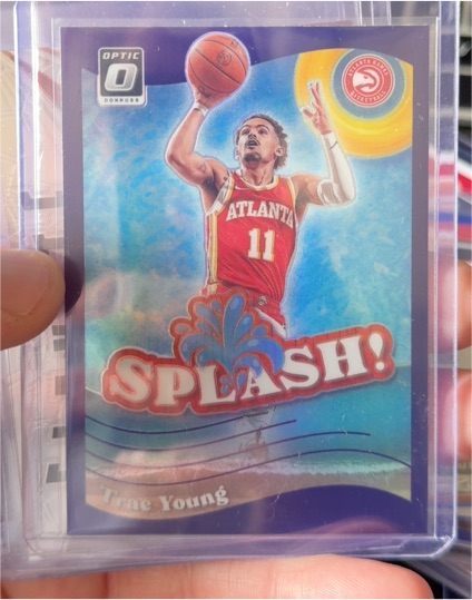 2023-24 Donruss Optic #1 Trae Young Splash! Purple Prizm — front