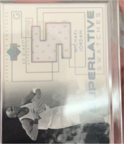 2003-04 Upper Deck Glass Superlative Swatches #SSMJ Michael Jordan — front