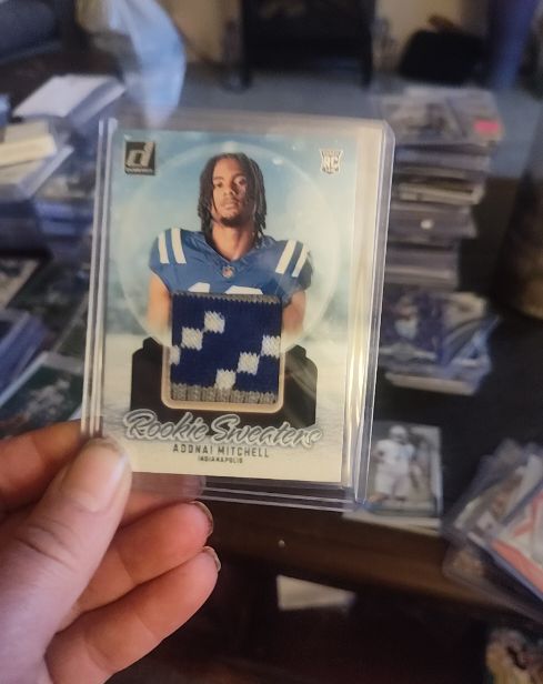 2024 Panini Donruss #RHS-AMI Adonai Mitchell Rookie Holiday Sweater — front