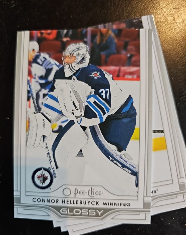 2025-26 O-Pee-Chee Glossy #OG-39 Connor Hellebuyck — front