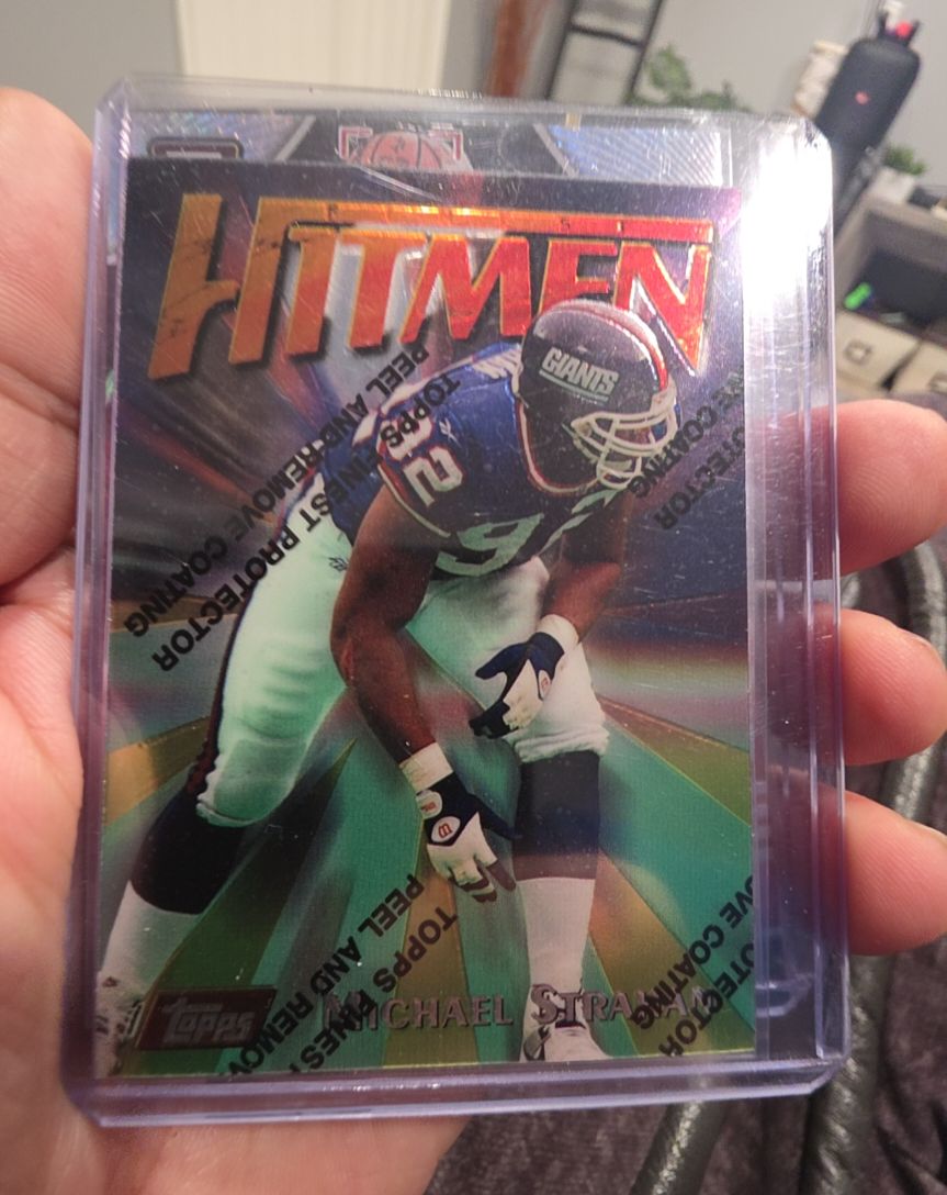 1997 Topps Finest Hitmen #79 Michael Strahan — front