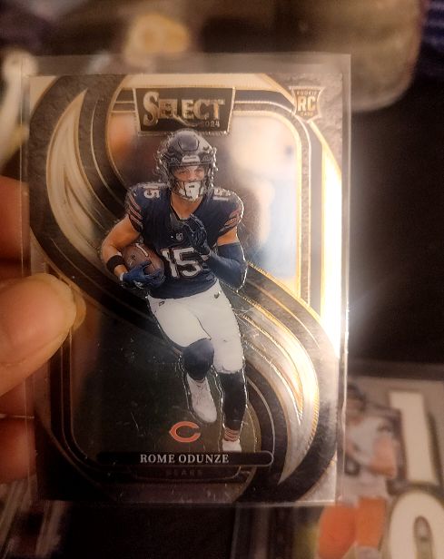 2024 Panini Select Premier Level #136 Rome Odunze — front