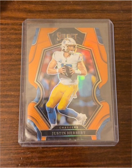 2020 Panini Select #144 Justin Herbert Orange Prizm Die-Cut RC — front