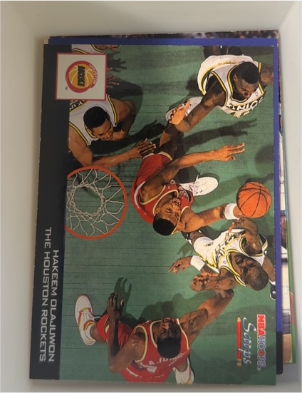 1993-94 NBA Hoops Scoops #HS10 Hakeem Olajuwon — front