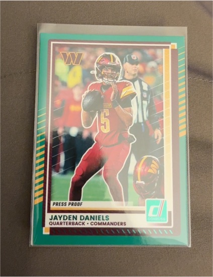 2025 Panini Donruss #28 Jayden Daniels Press Proof Green — front