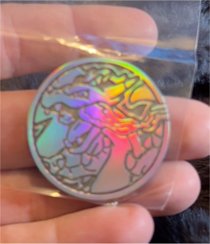 2025 Pokémon Mega Charizard X EX UPC Ultra Premium Collection Metal Coin — front