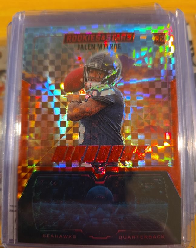 2025 Panini Rookies & Stars #23 Jalen Milroe Airborne Red Plaid Prizm Rookie — front