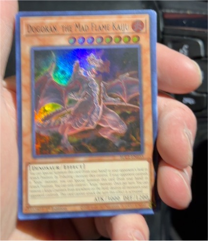 Yu-Gi-Oh! 2017 OP05-EN004 Dogoran, the Mad Flame Kaiju — front