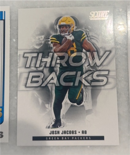 2025 Panini Score #7 Josh Jacobs Throwbacks — front