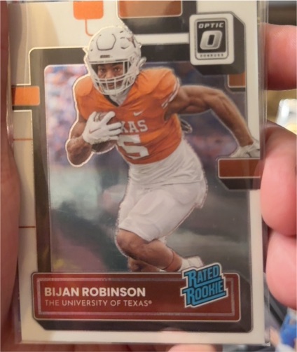 2023 Panini Chronicles Draft Picks Donruss Optic #20 Bijan Robinson Rated Rookie — front