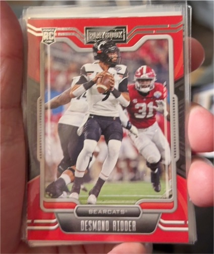2022 Panini Chronicles Draft Picks Playbook #7 Desmond Ridder — front