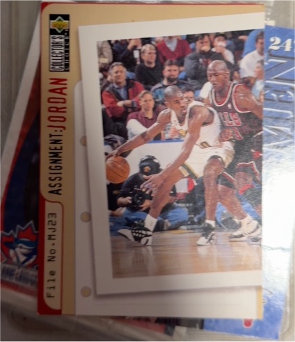 1996-97 Upper Deck Collector's Choice Assignment Jordan #MJ23 Michael Jordan — front