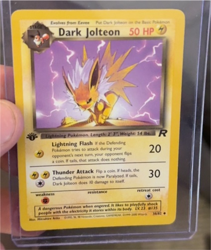 1999 Team Rocket #38 Dark Jolteon — front