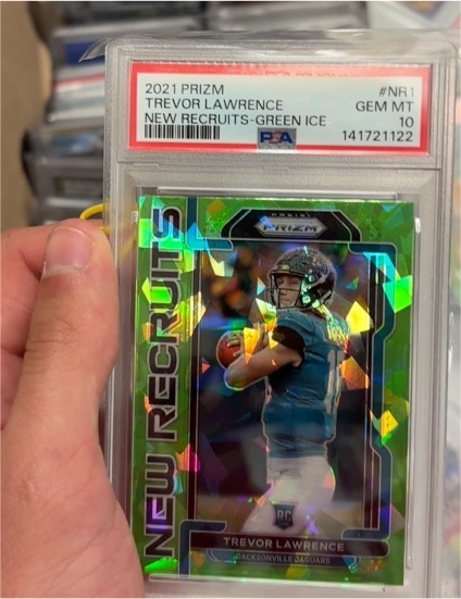 2021 Panini Prizm #NR1 Trevor Lawrence New Recruits Green Ice — front