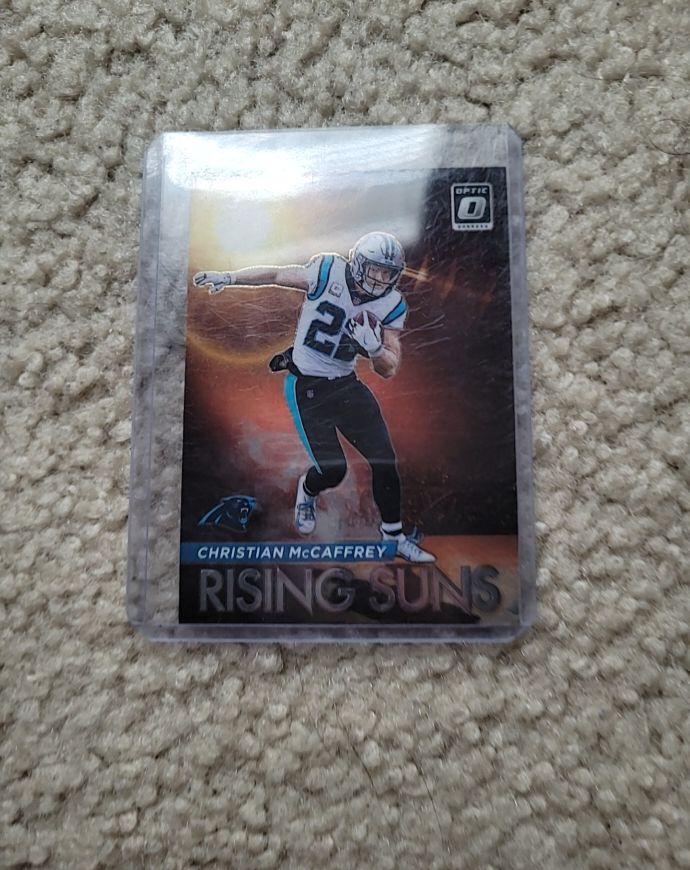 2021 Panini Donruss Optic Rising Suns #RS-6 Christian McCaffrey — front