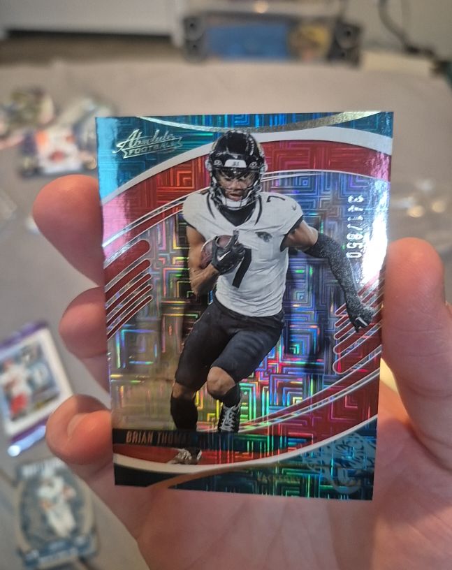 2025 Panini Absolute #67 Brian Thomas Jr. Red Squares /850 — front