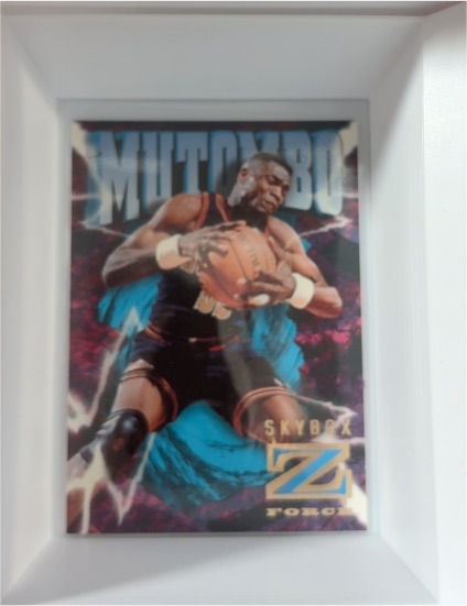 1996-97 Skybox Z-Force #24 Dikembe Mutombo — front