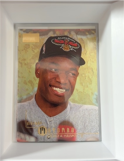 1996-97 SkyBox Premium #4 Dikembe Mutombo — front