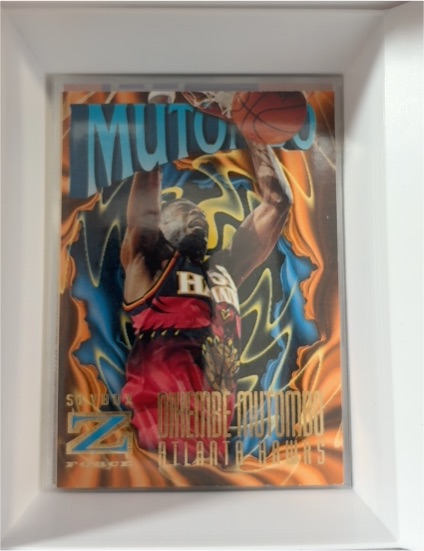 1996-97 SkyBox Z-Force #101 Dikembe Mutombo — front