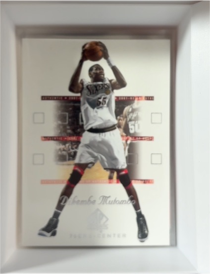 2001-02 SP Authentic #65 Dikembe Mutombo — front