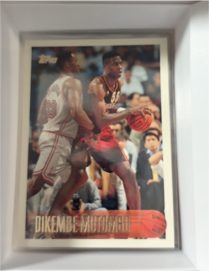 1997-98 Topps #63 Dikembe Mutombo — front