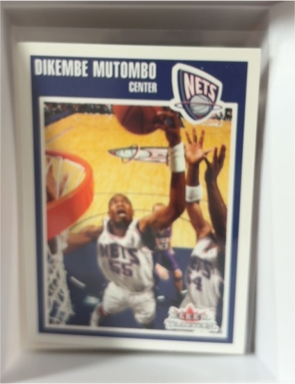 2002-03 Fleer Tradition #89 Dikembe Mutombo — front