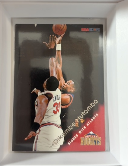 1996-97 NBA Hoops #42 Dikembe Mutombo — front