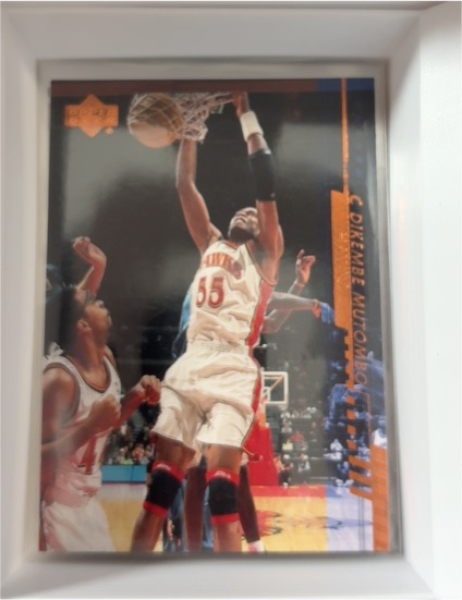 2000-01 Upper Deck #1 Dikembe Mutombo — front