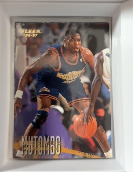 1996-97 Fleer #27 Dikembe Mutombo — front