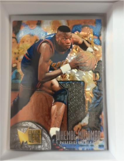 1995-96 Fleer Metal #25 Dikembe Mutombo — front