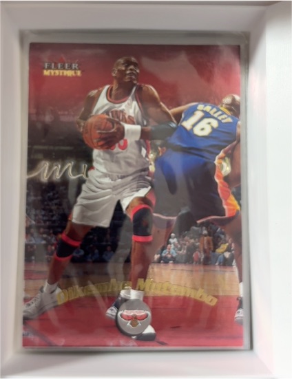 2000-01 Fleer Mystique #92 Dikembe Mutombo — front