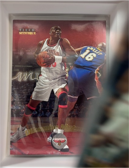 2000-01 Fleer Mystique #92 Dikembe Mutombo — front