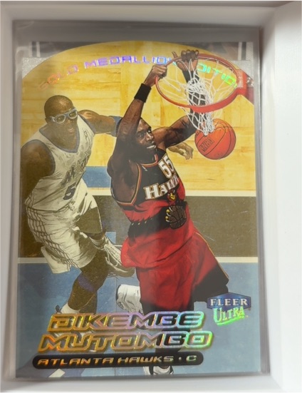 1999-00 Fleer Ultra Gold Medallion #84G Dikembe Mutombo — front