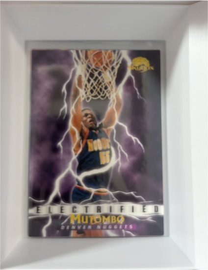 1995-96 SkyBox Premium #282 Dikembe Mutombo Electrified Denver Nuggets — front