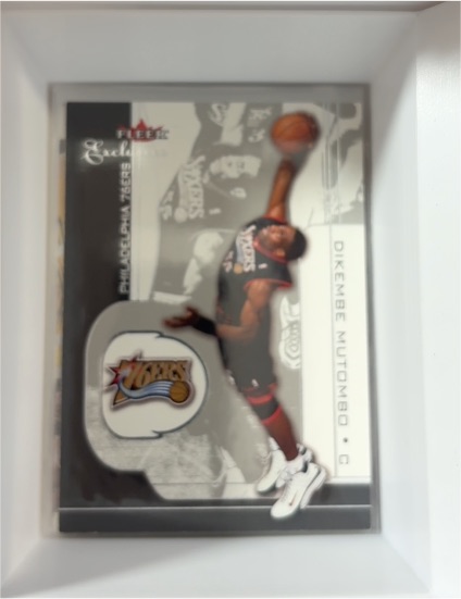 2001-02 Fleer Exclusive #3 Dikembe Mutombo — front