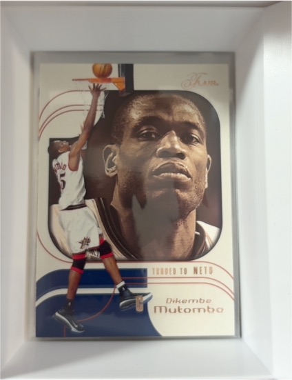 2002-03 Flair #86 Dikembe Mutombo — front