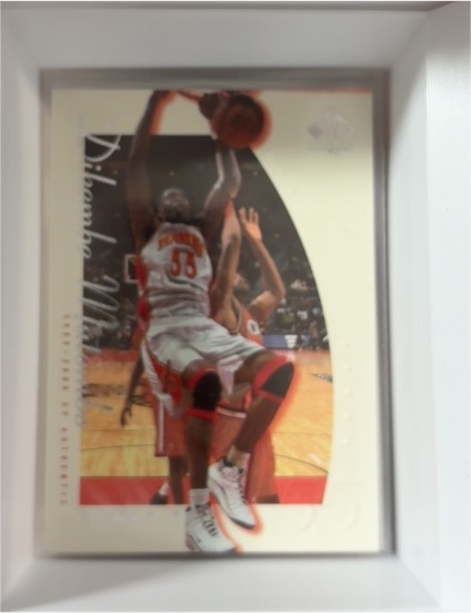 1999-00 SP Authentic #1 Dikembe Mutombo Atlanta Hawks — front