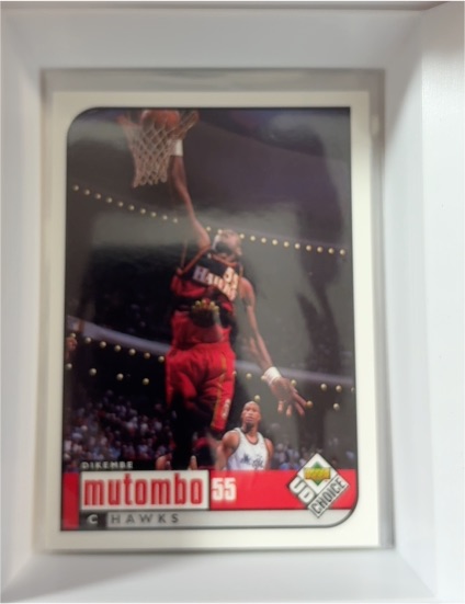 1998-99 Upper Deck UD Choice #1 Dikembe Mutombo — front