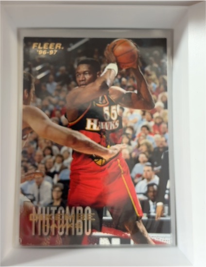 1996-97 Fleer #153 Dikembe Mutombo — front