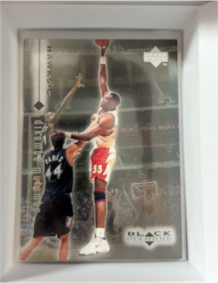 1998-99 Upper Deck Black Diamond #14 Dikembe Mutombo — front