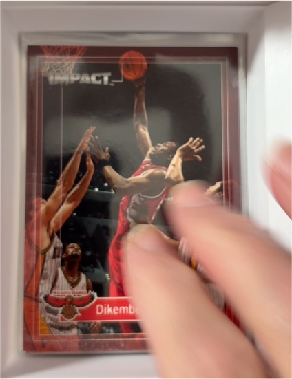 1999-00 SkyBox Impact #154 Dikembe Mutombo — front