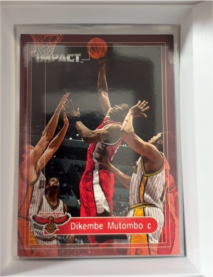 1999-00 SkyBox Impact #154 Dikembe Mutombo — front