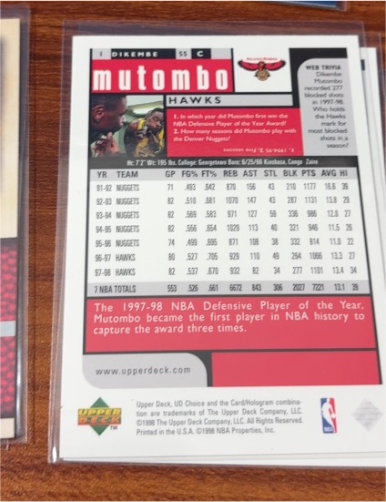 1997-98 Upper Deck UD Choice #1 Dikembe Mutombo — front