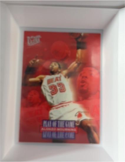1996-97 Fleer Ultra #295 Alonzo Mourning Play of the Game — front