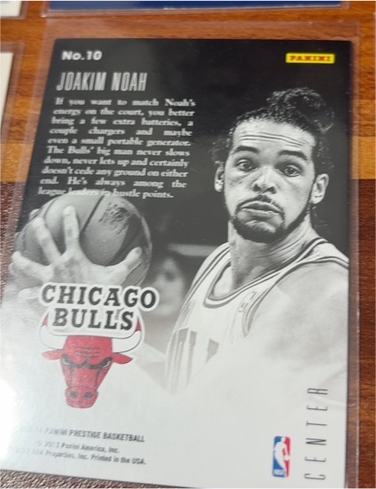 2013-14 Panini Prestige Prestigious Posts #10 Joakim Noah — front