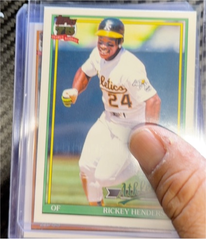 1991 Topps #T91-52 Rickey Henderson — front