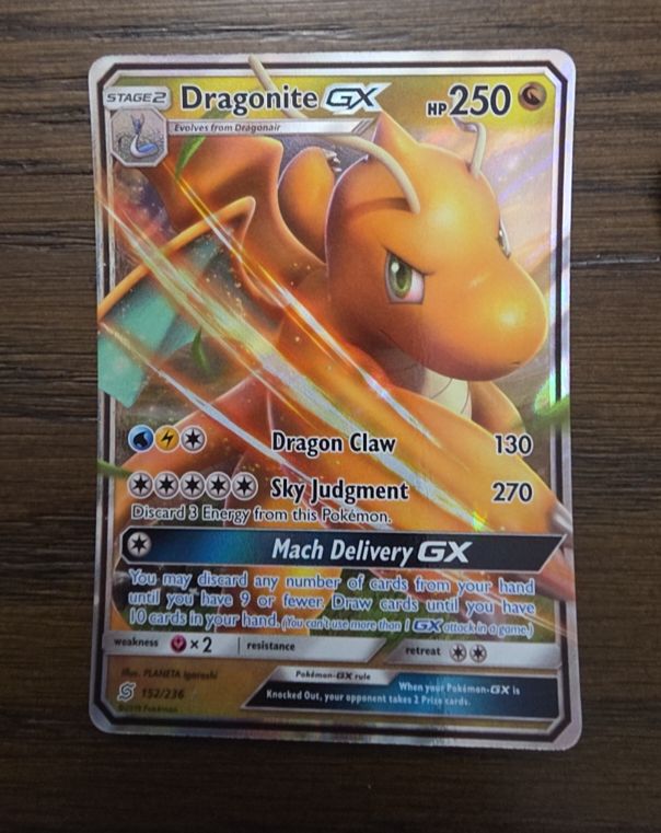 2019 Pokemon TCG Unified Minds #152 Dragonite GX — front