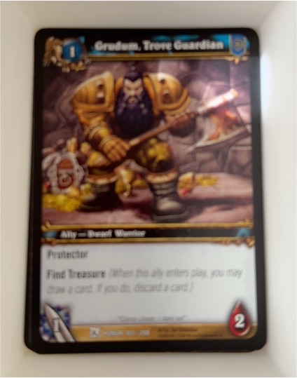 2009 World of Warcraft TCG Fields of Honor #101 Grudum, Trove Guardian — front